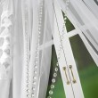 Komplet białych zasłon z firanami zdobiony zawieszkami 400x250cm GIULIA - Nie Tylko Firany
