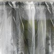 Firana woalowa w szare liście na taśmie 140x240cm TEIDA - Nie Tylko Firany